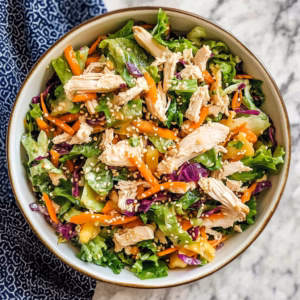 Brighten up your meal with this delicious Chinese Chicken Salad! Packed with tender chicken, crunchy veggies, and a zesty dressing, it’s a refreshing twist that everyone will love. Perfect for lunch or a light dinner, don’t forget to save this recipe for your next gathering or picnic! Enjoy a burst of flavors in every bite!